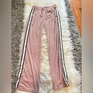 Light pink track pants with side stripes